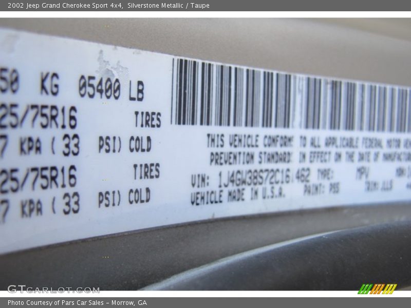Silverstone Metallic / Taupe 2002 Jeep Grand Cherokee Sport 4x4