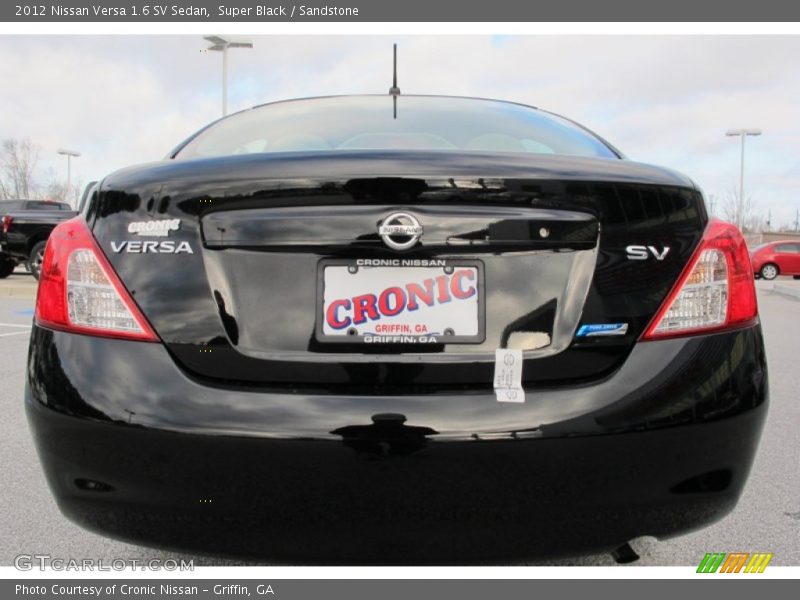 Super Black / Sandstone 2012 Nissan Versa 1.6 SV Sedan