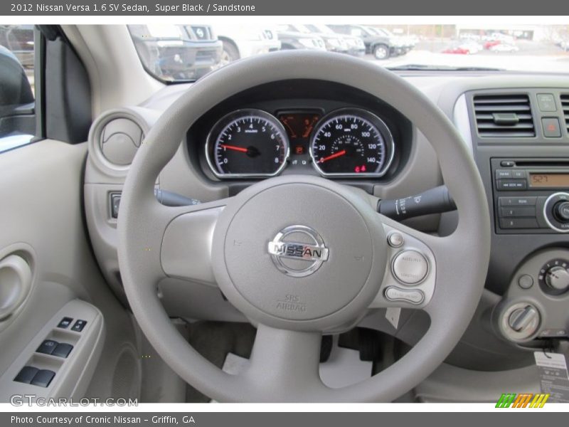 Super Black / Sandstone 2012 Nissan Versa 1.6 SV Sedan