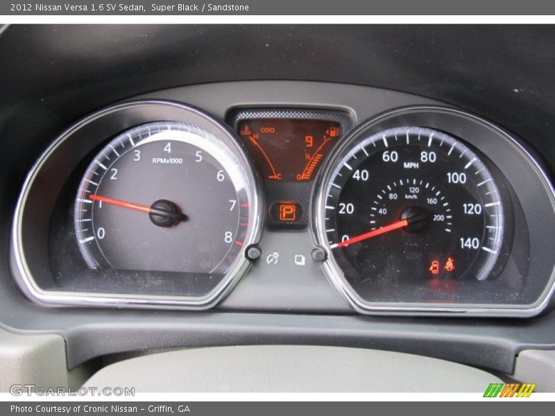 Super Black / Sandstone 2012 Nissan Versa 1.6 SV Sedan