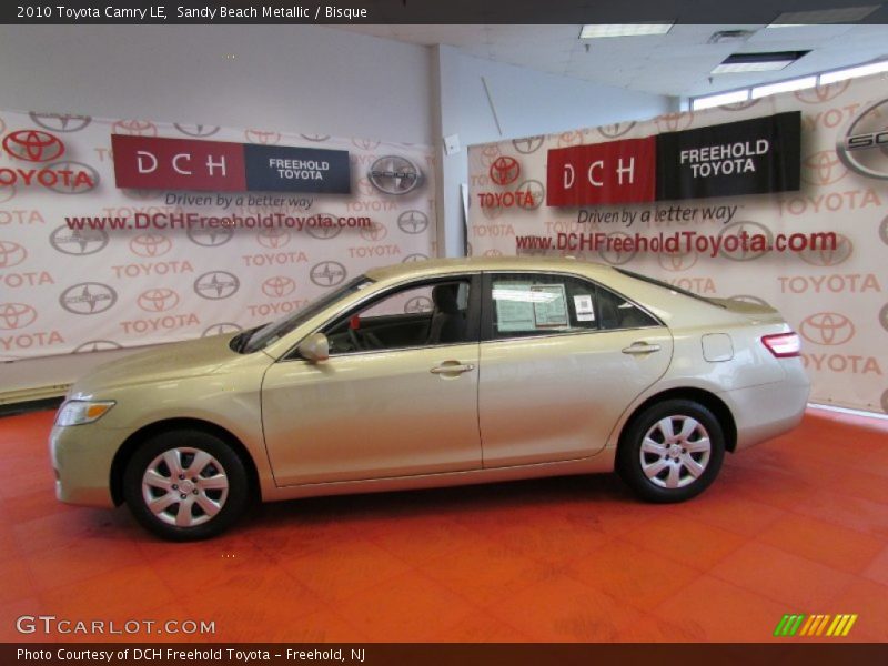 Sandy Beach Metallic / Bisque 2010 Toyota Camry LE