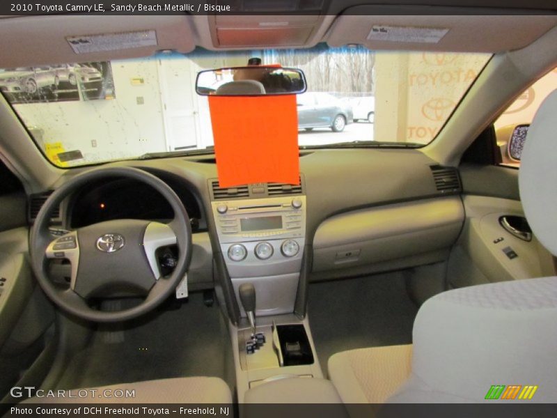 Sandy Beach Metallic / Bisque 2010 Toyota Camry LE