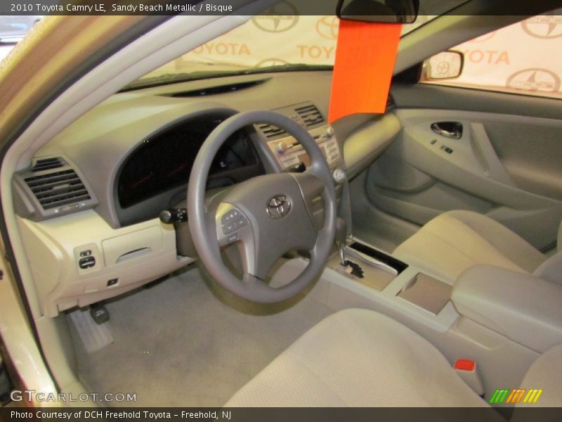 Sandy Beach Metallic / Bisque 2010 Toyota Camry LE