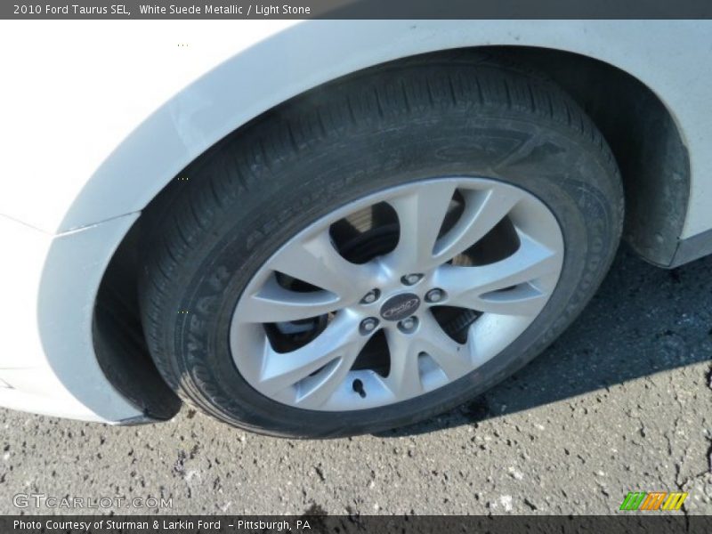 White Suede Metallic / Light Stone 2010 Ford Taurus SEL