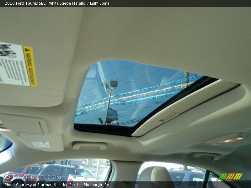 White Suede Metallic / Light Stone 2010 Ford Taurus SEL