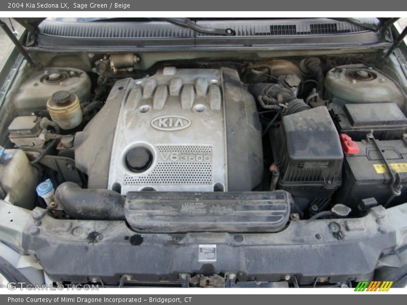 Sage Green / Beige 2004 Kia Sedona LX