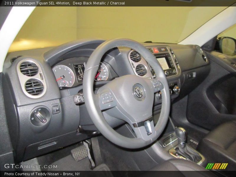 Deep Black Metallic / Charcoal 2011 Volkswagen Tiguan SEL 4Motion