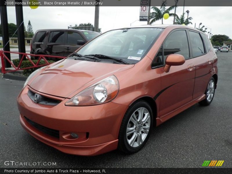 Blaze Orange Metallic / Black/Grey 2008 Honda Fit Sport