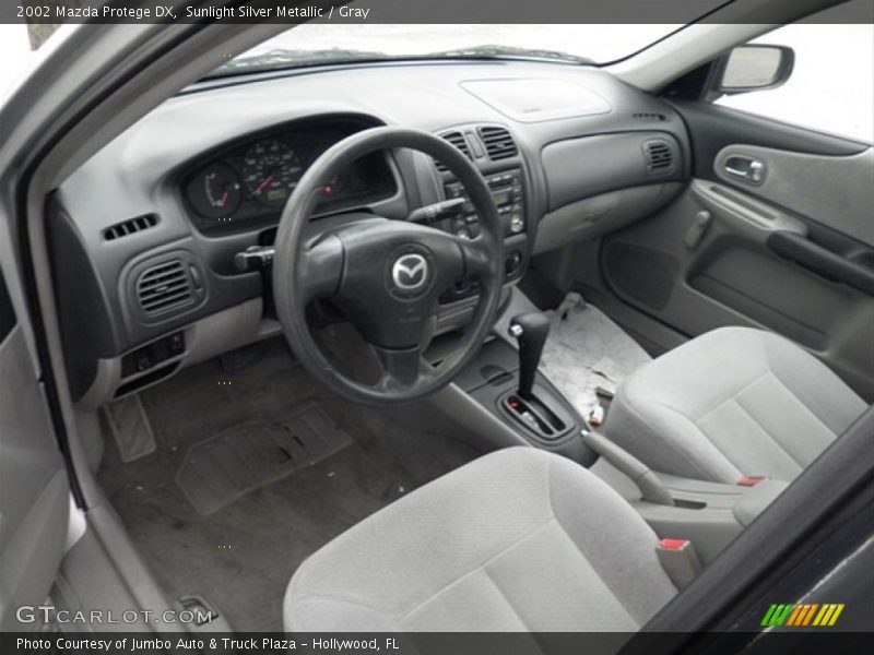 Sunlight Silver Metallic / Gray 2002 Mazda Protege DX