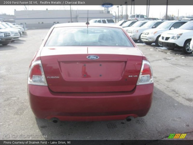 Redfire Metallic / Charcoal Black 2009 Ford Fusion SE V6