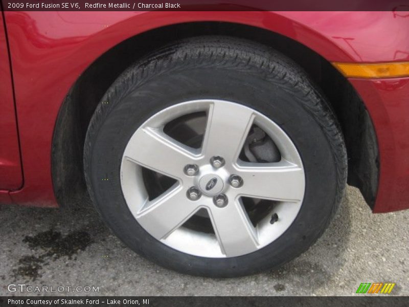 Redfire Metallic / Charcoal Black 2009 Ford Fusion SE V6