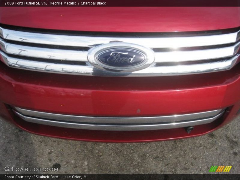 Redfire Metallic / Charcoal Black 2009 Ford Fusion SE V6