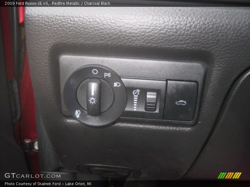 Redfire Metallic / Charcoal Black 2009 Ford Fusion SE V6