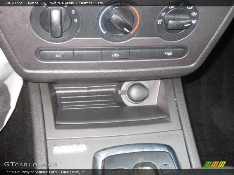 Redfire Metallic / Charcoal Black 2009 Ford Fusion SE V6