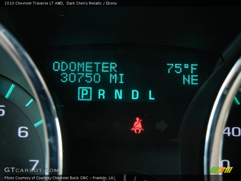 Dark Cherry Metallic / Ebony 2010 Chevrolet Traverse LT AWD