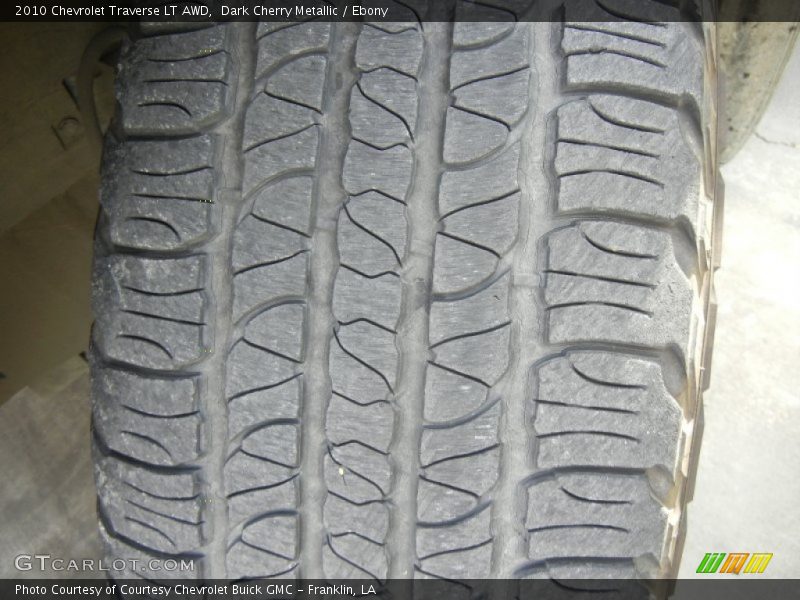 Dark Cherry Metallic / Ebony 2010 Chevrolet Traverse LT AWD