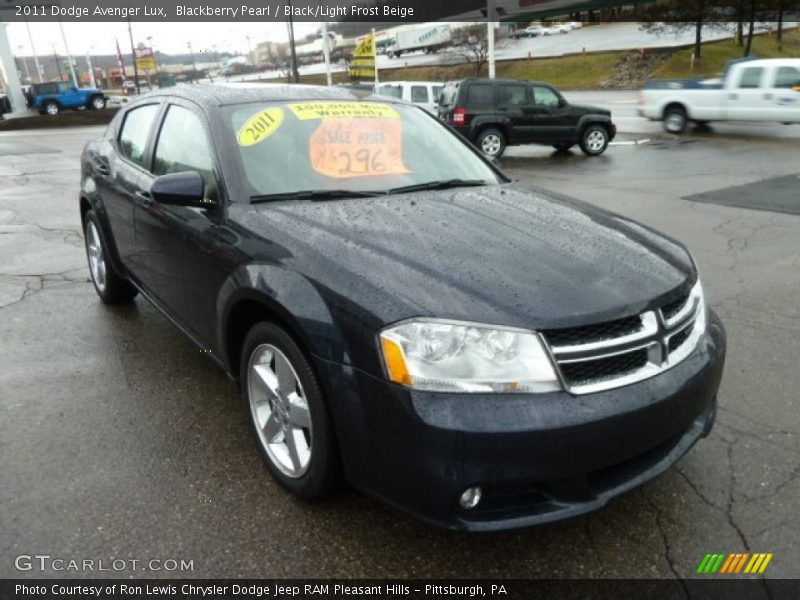 Front 3/4 View of 2011 Avenger Lux