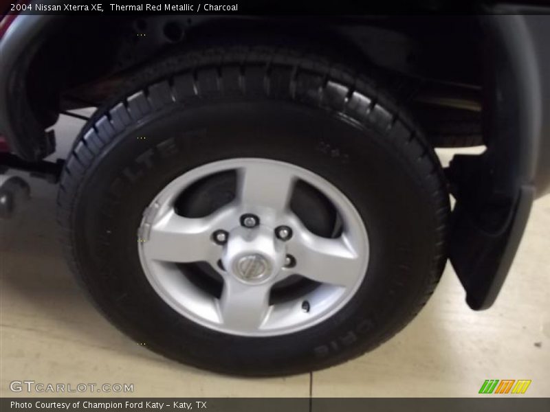 Thermal Red Metallic / Charcoal 2004 Nissan Xterra XE