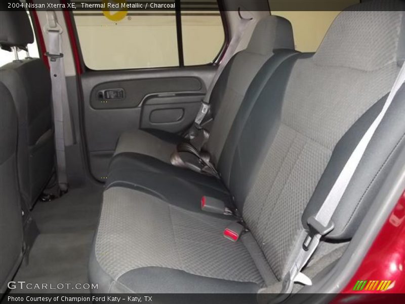 Thermal Red Metallic / Charcoal 2004 Nissan Xterra XE
