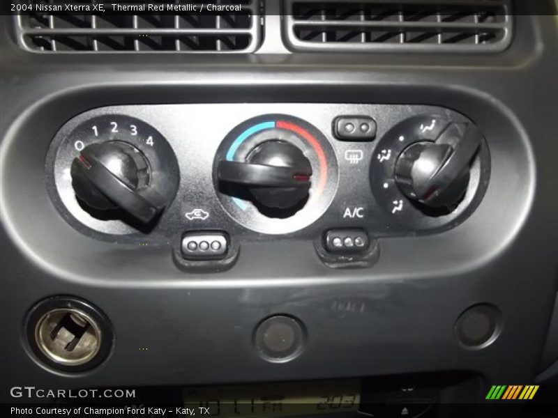 Thermal Red Metallic / Charcoal 2004 Nissan Xterra XE