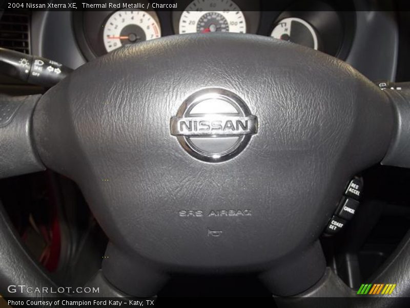 Thermal Red Metallic / Charcoal 2004 Nissan Xterra XE