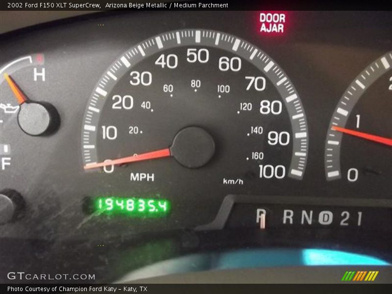 Arizona Beige Metallic / Medium Parchment 2002 Ford F150 XLT SuperCrew