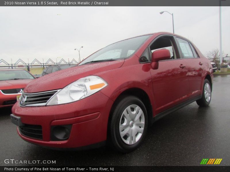 Red Brick Metallic / Charcoal 2010 Nissan Versa 1.8 S Sedan