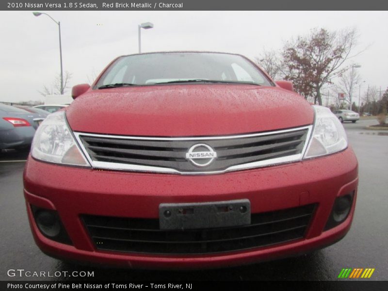 Red Brick Metallic / Charcoal 2010 Nissan Versa 1.8 S Sedan
