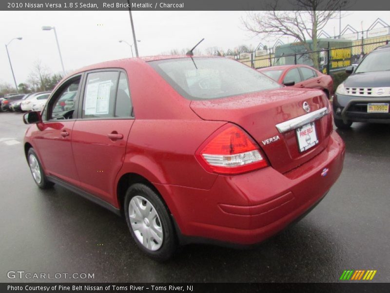 Red Brick Metallic / Charcoal 2010 Nissan Versa 1.8 S Sedan