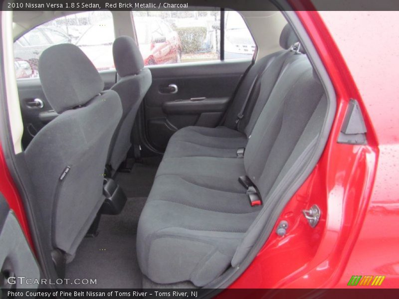 Red Brick Metallic / Charcoal 2010 Nissan Versa 1.8 S Sedan
