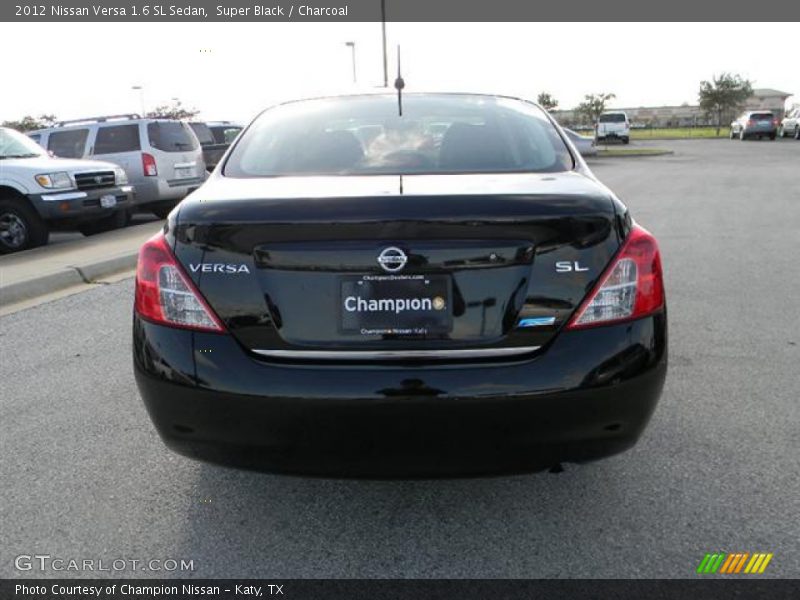 Super Black / Charcoal 2012 Nissan Versa 1.6 SL Sedan