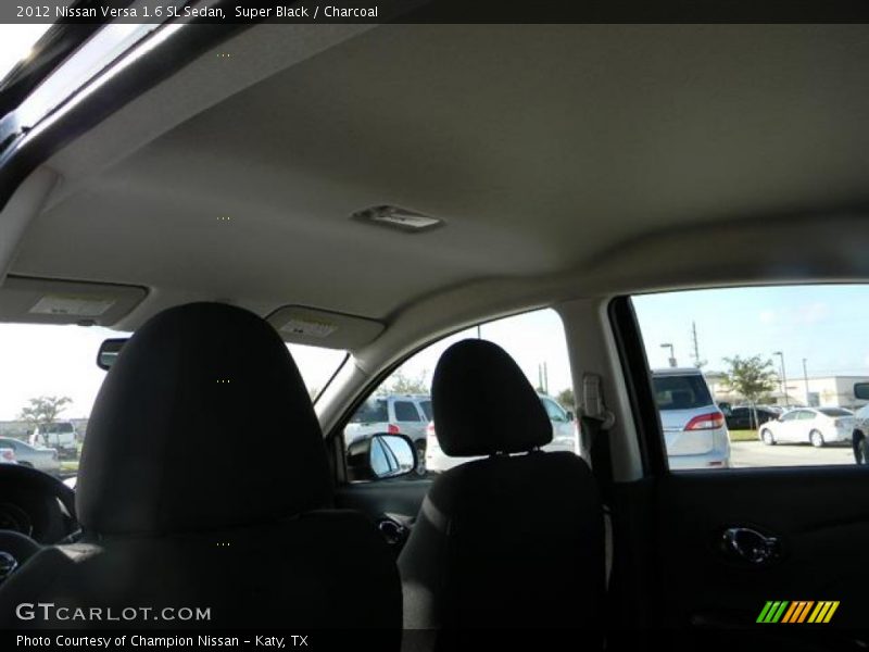 Super Black / Charcoal 2012 Nissan Versa 1.6 SL Sedan