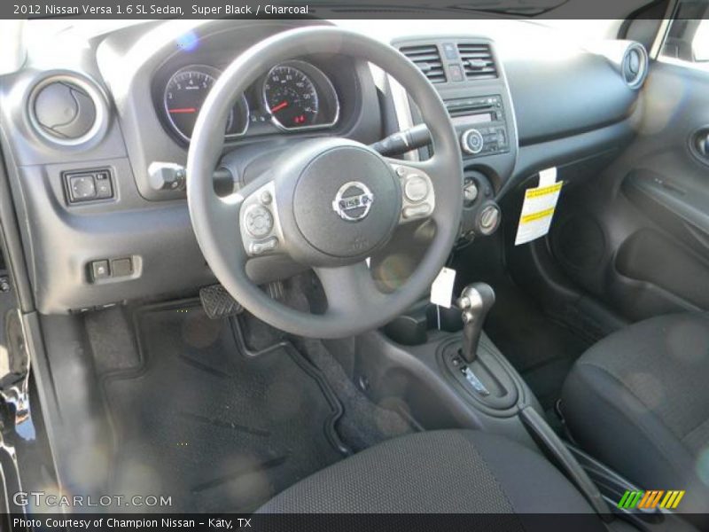 Super Black / Charcoal 2012 Nissan Versa 1.6 SL Sedan