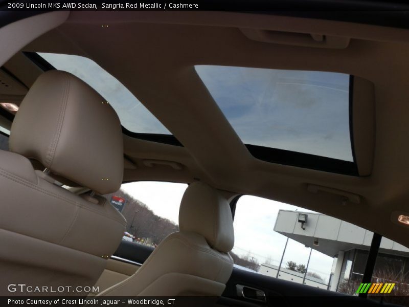 Sangria Red Metallic / Cashmere 2009 Lincoln MKS AWD Sedan