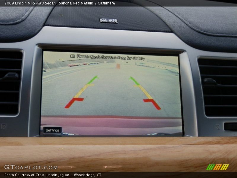 Sangria Red Metallic / Cashmere 2009 Lincoln MKS AWD Sedan
