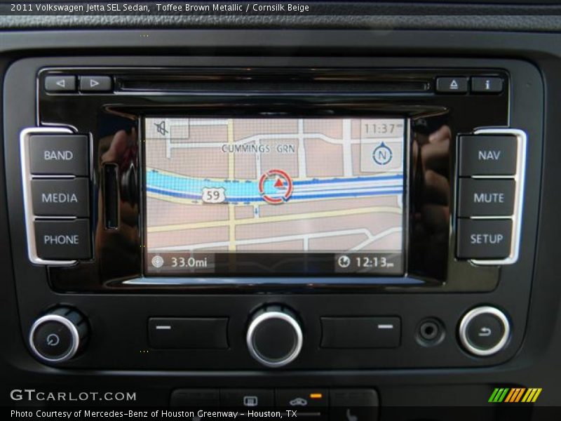 Toffee Brown Metallic / Cornsilk Beige 2011 Volkswagen Jetta SEL Sedan