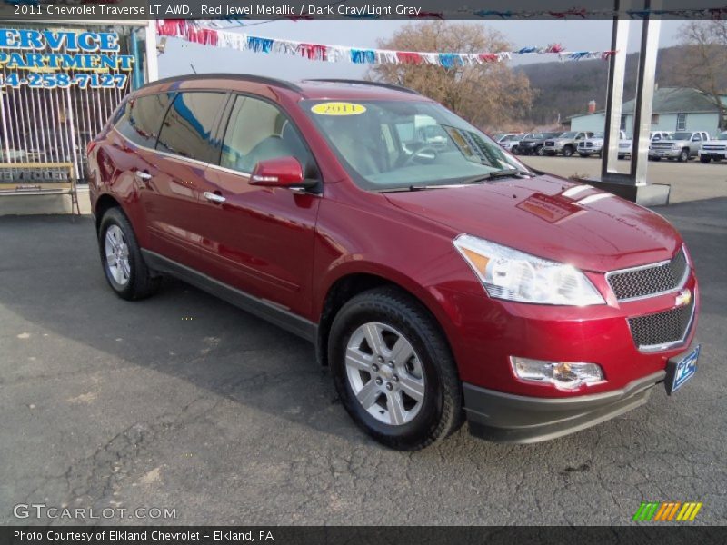 Red Jewel Metallic / Dark Gray/Light Gray 2011 Chevrolet Traverse LT AWD