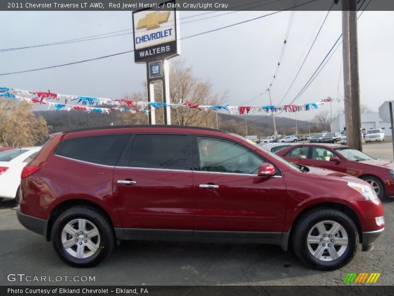 Red Jewel Metallic / Dark Gray/Light Gray 2011 Chevrolet Traverse LT AWD