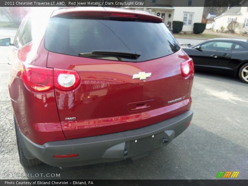 Red Jewel Metallic / Dark Gray/Light Gray 2011 Chevrolet Traverse LT AWD