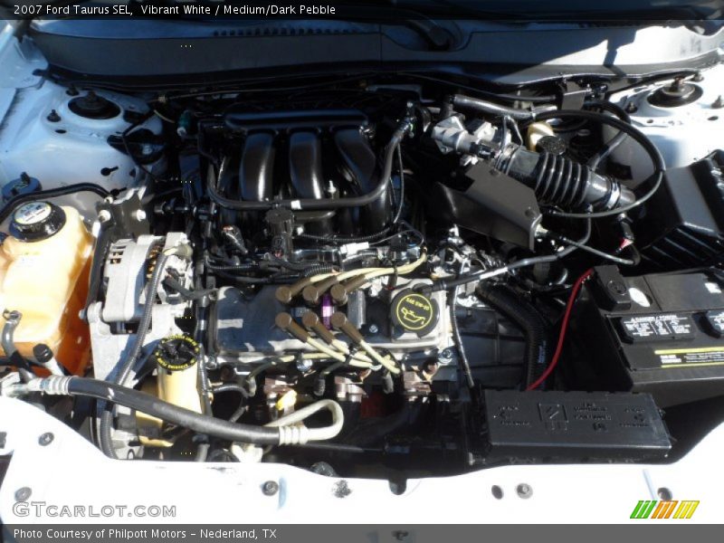Vibrant White / Medium/Dark Pebble 2007 Ford Taurus SEL