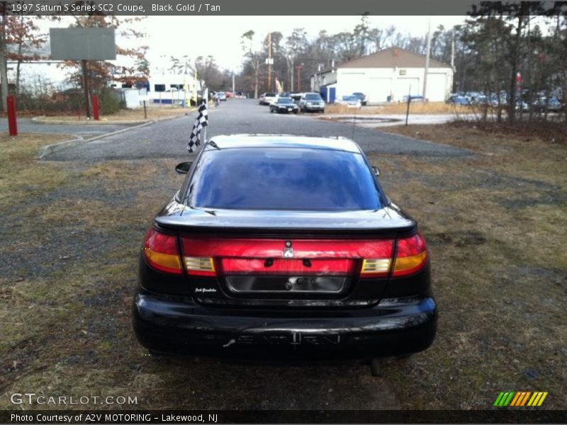 Black Gold / Tan 1997 Saturn S Series SC2 Coupe
