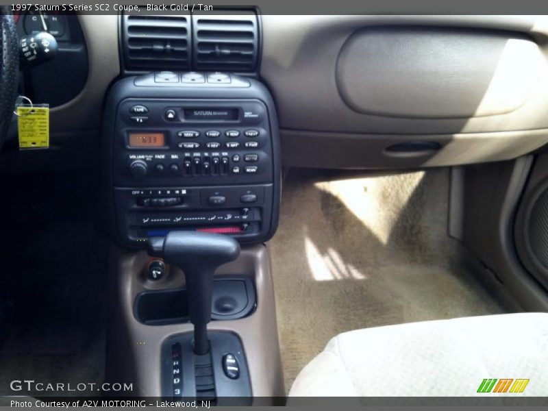 Black Gold / Tan 1997 Saturn S Series SC2 Coupe