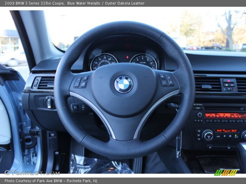 Blue Water Metallic / Oyster Dakota Leather 2009 BMW 3 Series 328xi Coupe