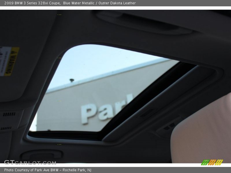 Blue Water Metallic / Oyster Dakota Leather 2009 BMW 3 Series 328xi Coupe