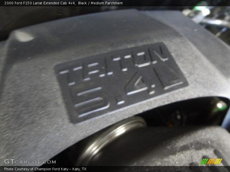 Black / Medium Parchment 2000 Ford F150 Lariat Extended Cab 4x4