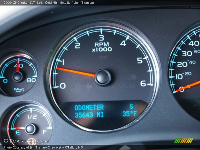 Gold Mist Metallic / Light Titanium 2009 GMC Yukon SLT 4x4