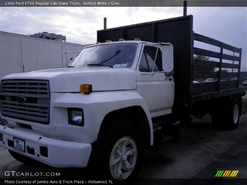 Oxford White / Grey 1990 Ford F700 Regular Cab Stake Truck