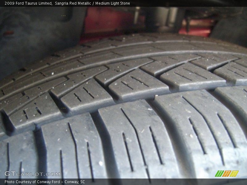 Sangria Red Metallic / Medium Light Stone 2009 Ford Taurus Limited