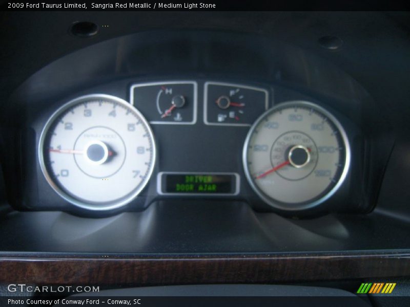 Sangria Red Metallic / Medium Light Stone 2009 Ford Taurus Limited