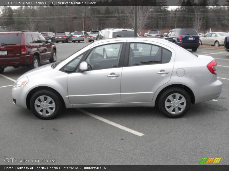 Quicksilver Metallic / Black 2010 Suzuki SX4 Sedan LE
